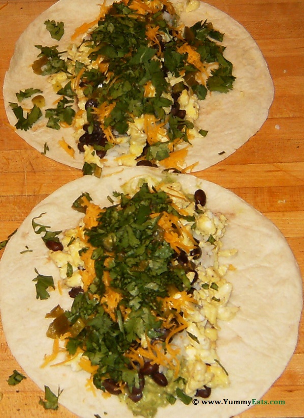 Egg and Rice Burritos, being assembled. Recipe from Big Bad Breakfast Cookbook.