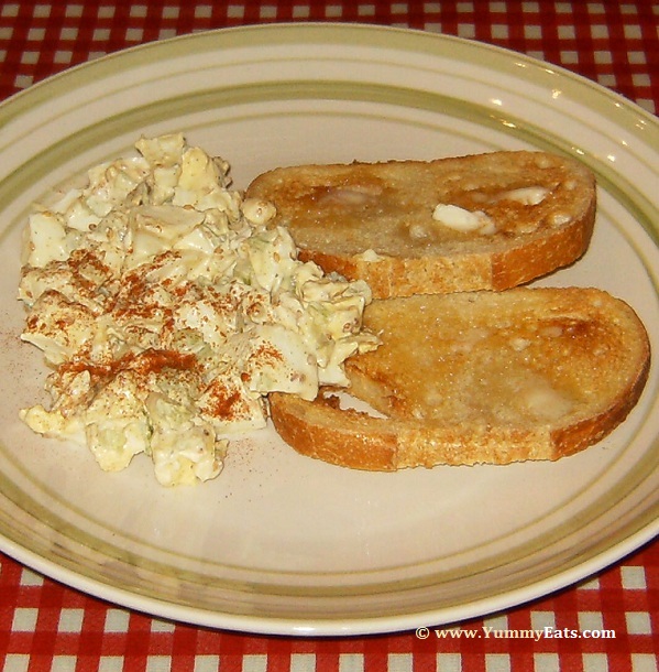 Egg Salad with buttered Sourdough Toast, plated and served.
