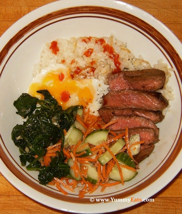 Beef Bibimbap with Crispy Rice and Sriracha - Plated recipe.