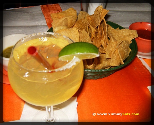 Have a Margarita cocktail with Tortilla Chips and Salsa, perfect for Cinco de Mayo holiday eats.