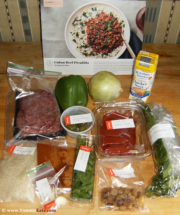 Plated box ingredients to make the Cuban Beef Picadillo dinner recipe.