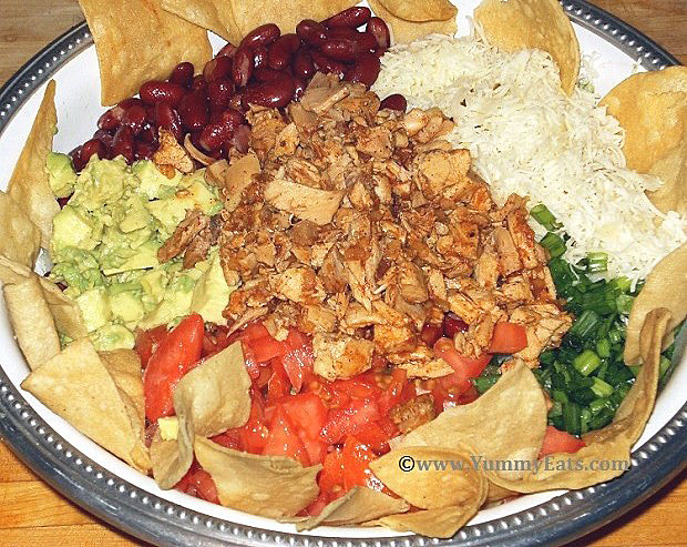 Yummy recipe for a Chicken Taco Salad, a big Mexican main course salad.