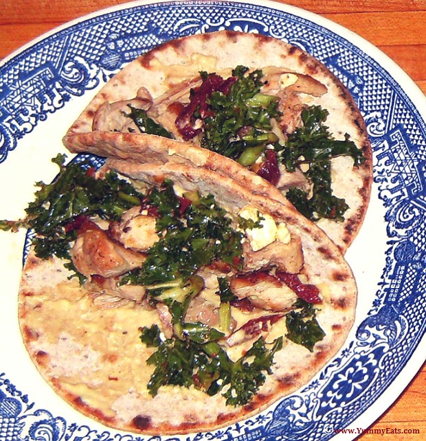 Chicken and hummus flatbread tacos, topped with Greek kale salad. A Sun Basket meal kit recipe.