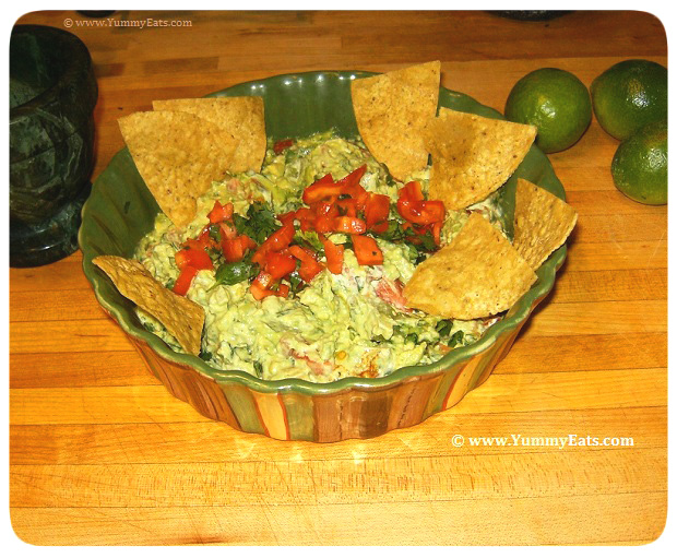 Homemade Guacamole Dip appetizer recipe, served with crispy Tortilla Chips.